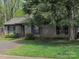 Cozy home with mature trees, healthy lawn, and comfortable, friendly curb appeal at 380 Sweetgum Dr, Fort Mill, SC 29715