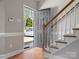 Foyer with hardwood floors and an open door, providing a glimpse into the natural surroundings at 405 N Wilson St # 103, Rock Hill, SC 29730