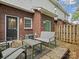 Brick patio features a table and chairs, creating a relaxing outdoor space at 405 N Wilson St # 103, Rock Hill, SC 29730