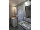 Bathroom featuring dual sinks with granite countertops, offering a functional and stylish space for daily routines at 4168 S Olivers Cross Rd # 6, Newton, NC 28658