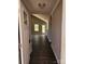 Inviting entryway with dark hardwood floors and a glimpse into the living area with natural light, creating a warm welcome at 4168 S Olivers Cross Rd # 6, Newton, NC 28658