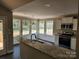 Well-lit kitchen with granite countertops, stainless steel appliances, and a bar area, perfect for casual dining and entertaining at 4168 S Olivers Cross Rd # 6, Newton, NC 28658