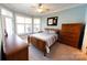 Comfortable bedroom with natural light, ceiling fan, and closet at 447 Shagbark Ct, Mount Gilead, NC 27306