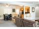 Open concept living space with dining area and kitchen access at 447 Shagbark Ct, Mount Gilead, NC 27306