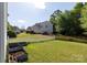 Spacious backyard with a mix of picket and wood fence, and several raised garden beds at 4707 Hannah Dr, Rock Hill, SC 29732