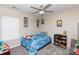 Inviting bedroom with carpeted floors, a ceiling fan, and vibrant decor creates a playful atmosphere at 4707 Hannah Dr, Rock Hill, SC 29732
