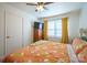 This bedroom features a ceiling fan, neutral walls, and a large window for natural light at 507 Texas Trl, Dallas, NC 28034