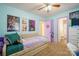Fun-themed bedroom featuring a cozy daybed, colorful decor, and carpeted floors at 507 Texas Trl, Dallas, NC 28034