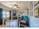 Comfortable living room with a sectional sofa, ceiling fan, and window views at 507 Texas Trl, Dallas, NC 28034