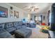 Inviting living room with a sectional sofa, lounge chair, and ample natural light at 507 Texas Trl, Dallas, NC 28034