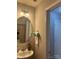 A bathroom with vanity, round mirror, and modern lighting fixtures at 529 Tribune Dr, Charlotte, NC 28214