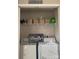 Efficient laundry room featuring shelving, storage baskets, washer and dryer at 529 Tribune Dr, Charlotte, NC 28214