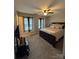 Comfortable main bedroom with neutral tones, plush carpeting, and a ceiling fan at 529 Tribune Dr, Charlotte, NC 28214
