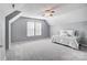 Spacious bedroom with a dormer window and a twin bed, perfect for relaxation at 62 Pond View Ln, Fort Mill, SC 29715