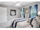 Bedroom with blue accents, neutral paint and decor, and ample natural light at 62 Pond View Ln, Fort Mill, SC 29715