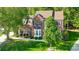 A slightly elevated shot of a brick home with well-kept lawn and mature landscaping at 62 Pond View Ln, Fort Mill, SC 29715