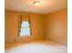 Cozy bedroom with neutral walls, offering a blank canvas to personalize and create a comfortable retreat at 6779 Highway 557 Hwy, Clover, SC 29710