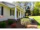 Inviting front porch with brick accents, offering a cozy space to relax and enjoy the outdoors at 6779 Highway 557 Hwy, Clover, SC 29710