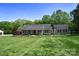 Charming single-story home with a well-manicured lawn and tasteful landscaping at 6779 Highway 557 Hwy, Clover, SC 29710