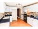 Kitchen featuring white cabinets, dark countertops, and tiled backsplash at 6779 Highway 557 Hwy, Clover, SC 29710