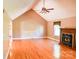 Spacious living room boasts wood floors, fireplace, and ample natural light with high ceilings at 6779 Highway 557 Hwy, Clover, SC 29710