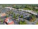 Overhead perspective of local businesses, parking, and landscaping in the commercial district at 6809 Copernicus Cir, Charlotte, NC 28226