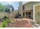 Backyard featuring a stone garden, patio, and siding at 6809 Copernicus Cir, Charlotte, NC 28226