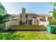 Backyard view highlighting the home's siding and a wood privacy fence at 6809 Copernicus Cir, Charlotte, NC 28226