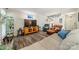 Comfortable living room with a fireplace, staircase, and stylish decor for relaxation and entertainment at 6809 Copernicus Cir, Charlotte, NC 28226