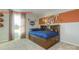 Nicely decorated bedroom with sports theme, carpet floors and great natural light at 7023 Butternut Oak Ter, Huntersville, NC 28078