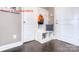 Practical mudroom with built-in bench, storage, and access to the garage at 7023 Butternut Oak Ter, Huntersville, NC 28078