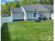 Backyard features a cozy patio and comfortable seating, perfect for relaxation at 715 Cody Ct, Fort Mill, SC 29715