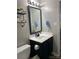 Modern bathroom with a sleek vanity, stylish mirror, and updated fixtures at 715 Cody Ct, Fort Mill, SC 29715