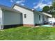 Backyard features a cozy patio and comfortable seating, perfect for outdoor lounging at 715 Cody Ct, Fort Mill, SC 29715