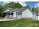 This single Gathering home features an attached garage, brick and siding exterior, and a well-maintained lawn at 715 Cody Ct, Fort Mill, SC 29715