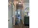 Inviting hallway with a decorative bench and view into other rooms of the house at 715 Cody Ct, Fort Mill, SC 29715