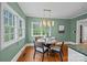 Bright dining area with a table set by a window, perfect for enjoying meals at 740 Woodlawn Ave, Mount Holly, NC 28120
