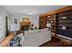 Inviting living room with a fireplace, bookshelf, and comfortable seating at 740 Woodlawn Ave, Mount Holly, NC 28120