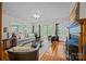 Cozy living room with a fireplace, comfortable seating, and hardwood floors at 740 Woodlawn Ave, Mount Holly, NC 28120