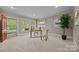 Bright office featuring a large window offering natural light and a view of outdoors at 740 Woodlawn Ave, Mount Holly, NC 28120