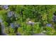 Aerial view showcasing the property lines of 7514 Pewter Ln, nestled among mature trees and landscaping at 7514 Pewter Ln, Charlotte, NC 28270