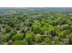 Lush treetop aerial view of 7514 Pewter Ln, a tranquil and secluded property surrounded by natural beauty at 7514 Pewter Ln, Charlotte, NC 28270