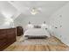 Bright bedroom with a ceiling fan, neutral color palette and a decorative rug at 7514 Pewter Ln, Charlotte, NC 28270