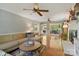 Spacious living room featuring hardwood floors, fireplace and many windows at 7514 Pewter Ln, Charlotte, NC 28270