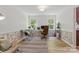 Bright office space with a large window and plenty of room for desk and seating at 7514 Pewter Ln, Charlotte, NC 28270