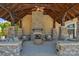 Stone fireplace with outdoor seating in the clubhouse at 8100 Skye Knoll Dr # 144, Waxhaw, NC 28173
