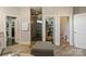 Spacious bathroom showcasing a glass shower, walk-in closet, and adjacent toilet room at 9611 Pensive Ln, Waxhaw, NC 28173