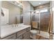 Modern bathroom features stylish tiling in the shower and updated fixtures and hardware at 9611 Pensive Ln, Waxhaw, NC 28173