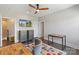 Cozy bedroom with ceiling fan, TV, and a colorful rug at 9611 Pensive Ln, Waxhaw, NC 28173