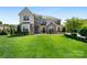 Charming home with lush lawn, stone accents, and well-maintained landscaping creates curb appeal at 9611 Pensive Ln, Waxhaw, NC 28173